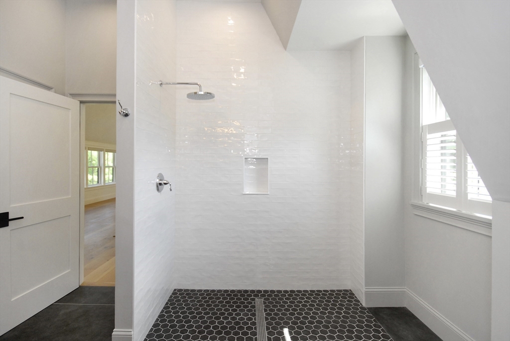 11 Williams Road Concord, MA 01742 - Photo 29 of 42 a bathroom with a sink and a shower