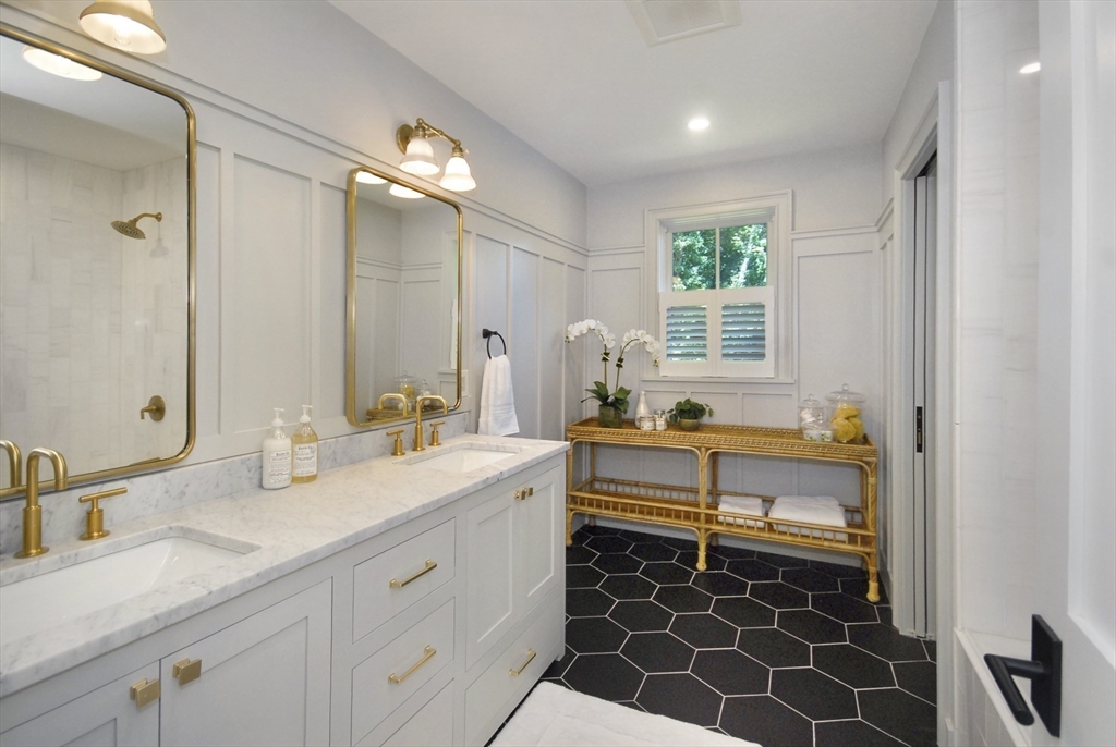 11 Williams Road Concord, MA 01742 - Photo 31 of 42 a spacious bathroom with a double vanity sink mirror and double
