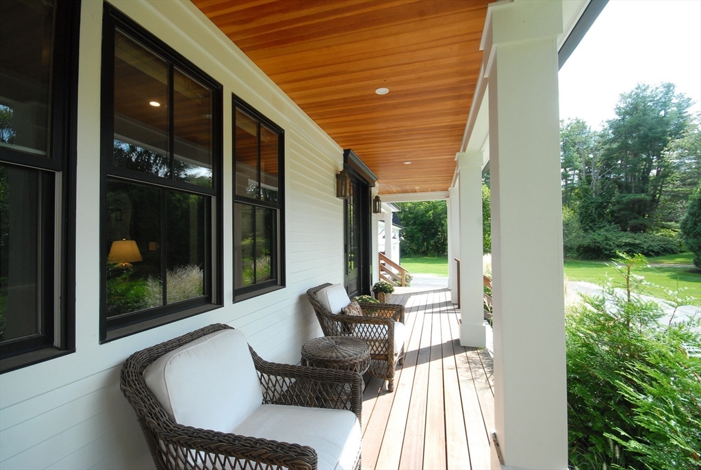 11 Williams Road Concord, MA 01742 - Photo 35 of 42 a balcony with furniture and garden view