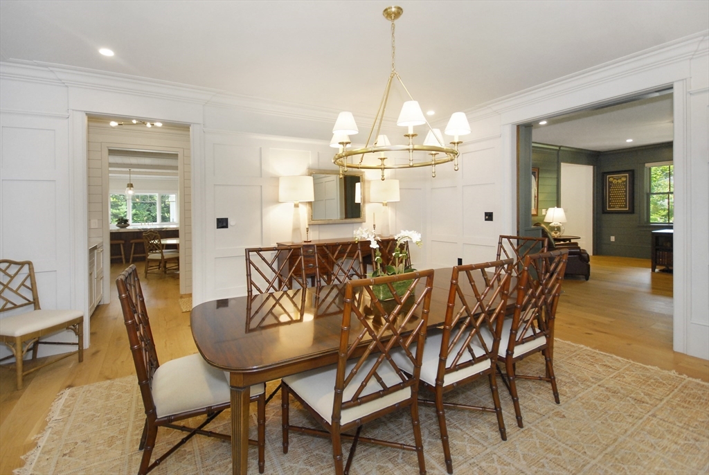 11 Williams Road Concord, MA 01742 - Photo 9 of 42 a view of a dining room with furniture a chandelier and wooden floor