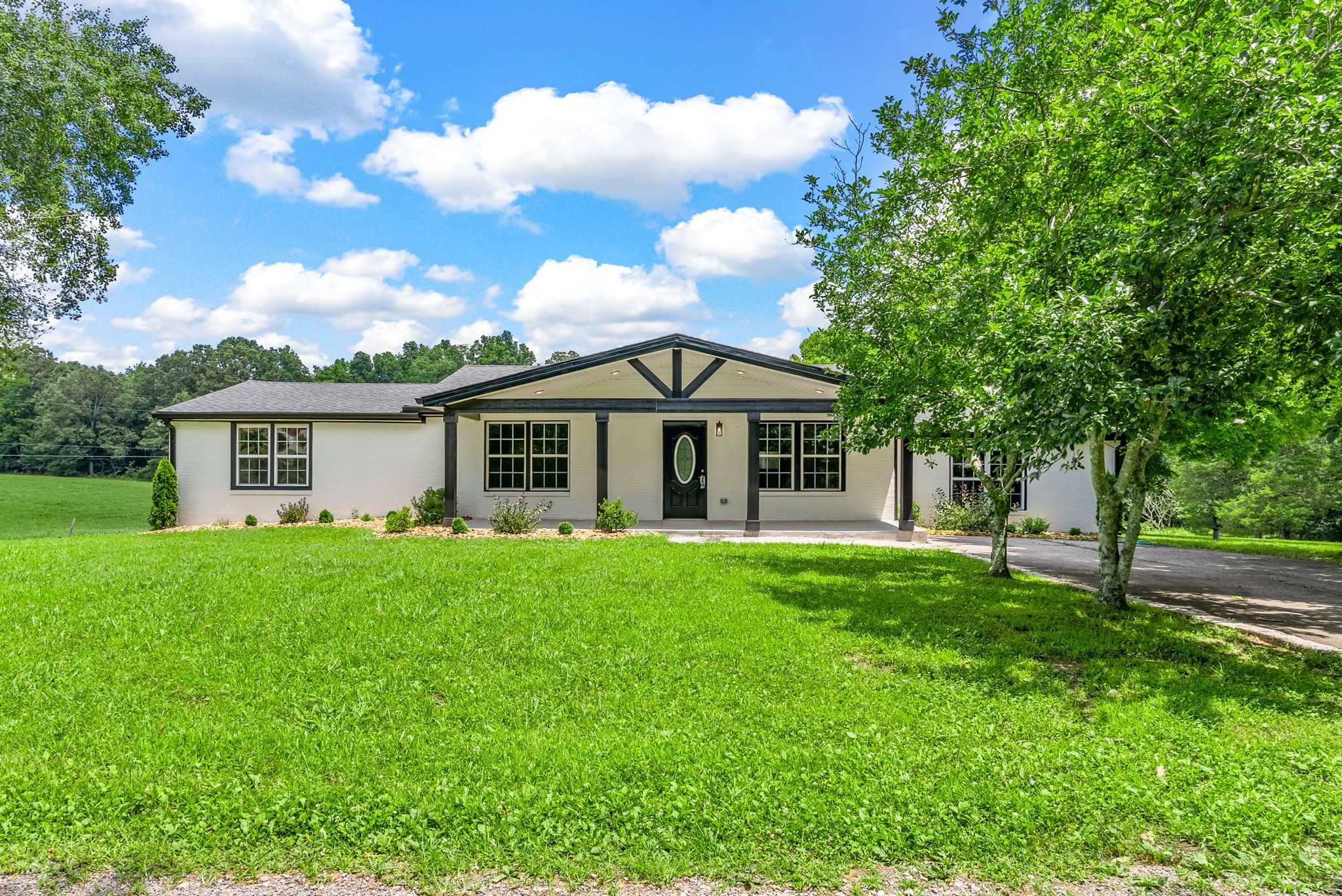 138 Walker Ridge Road Big Rock, TN 37023 - Photo 1 of 42 a front view of house with yard and green space