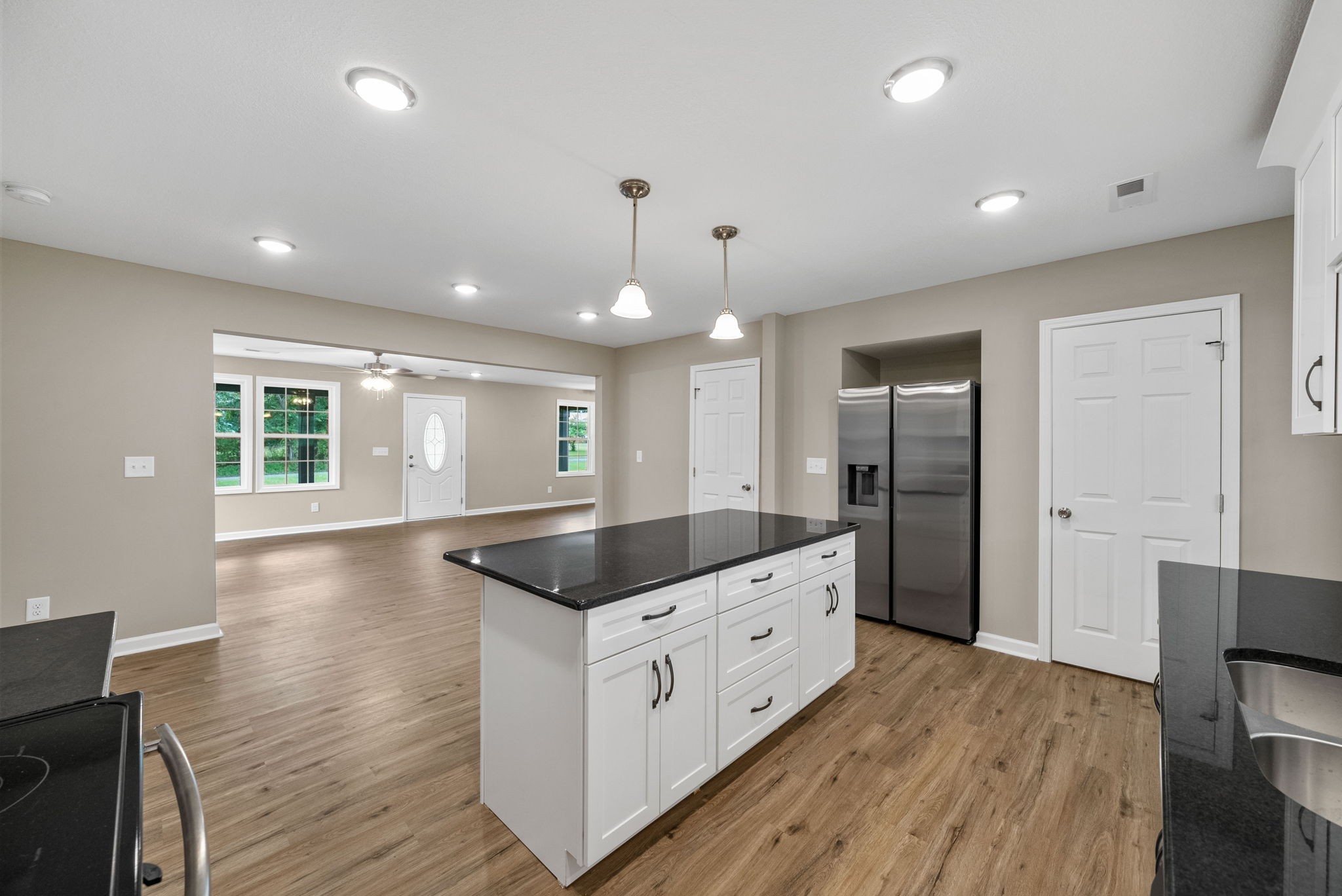 138 Walker Ridge Road Big Rock, TN 37023 - Photo 11 of 42 a kitchen with granite countertop a sink and refrigerator