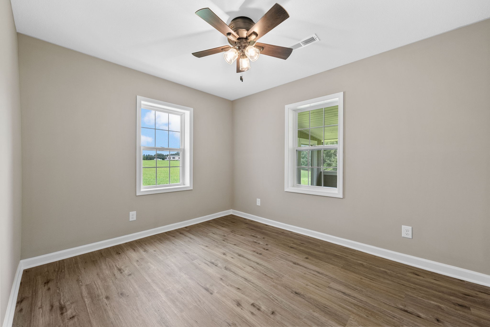 138 Walker Ridge Road Big Rock, TN 37023 - Photo 27 of 42 wooden floor in an empty room with a window