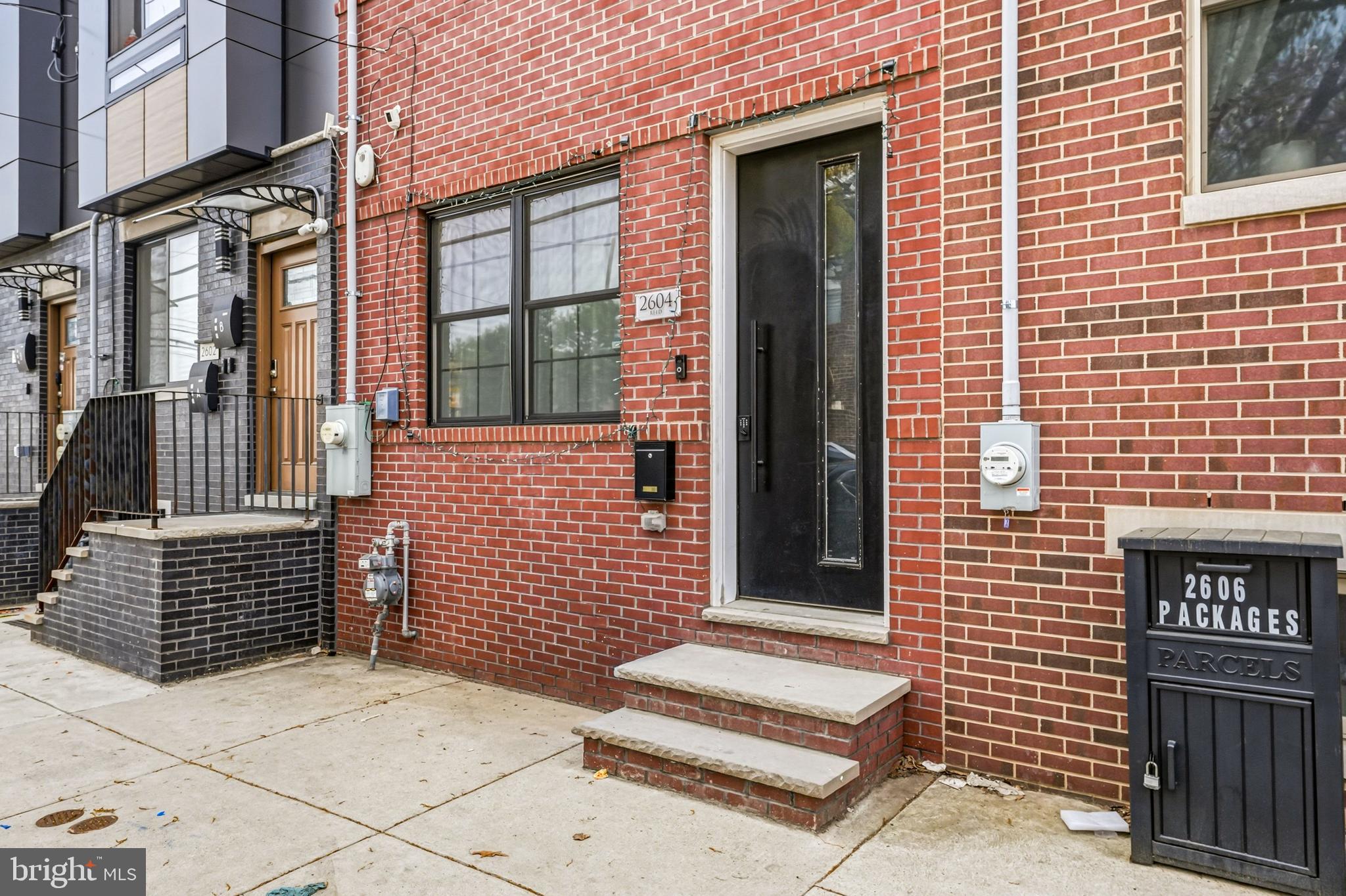 2604 Reed Street Philadelphia, PA 19146 - Photo 4 of 45 a front view of a building with a window