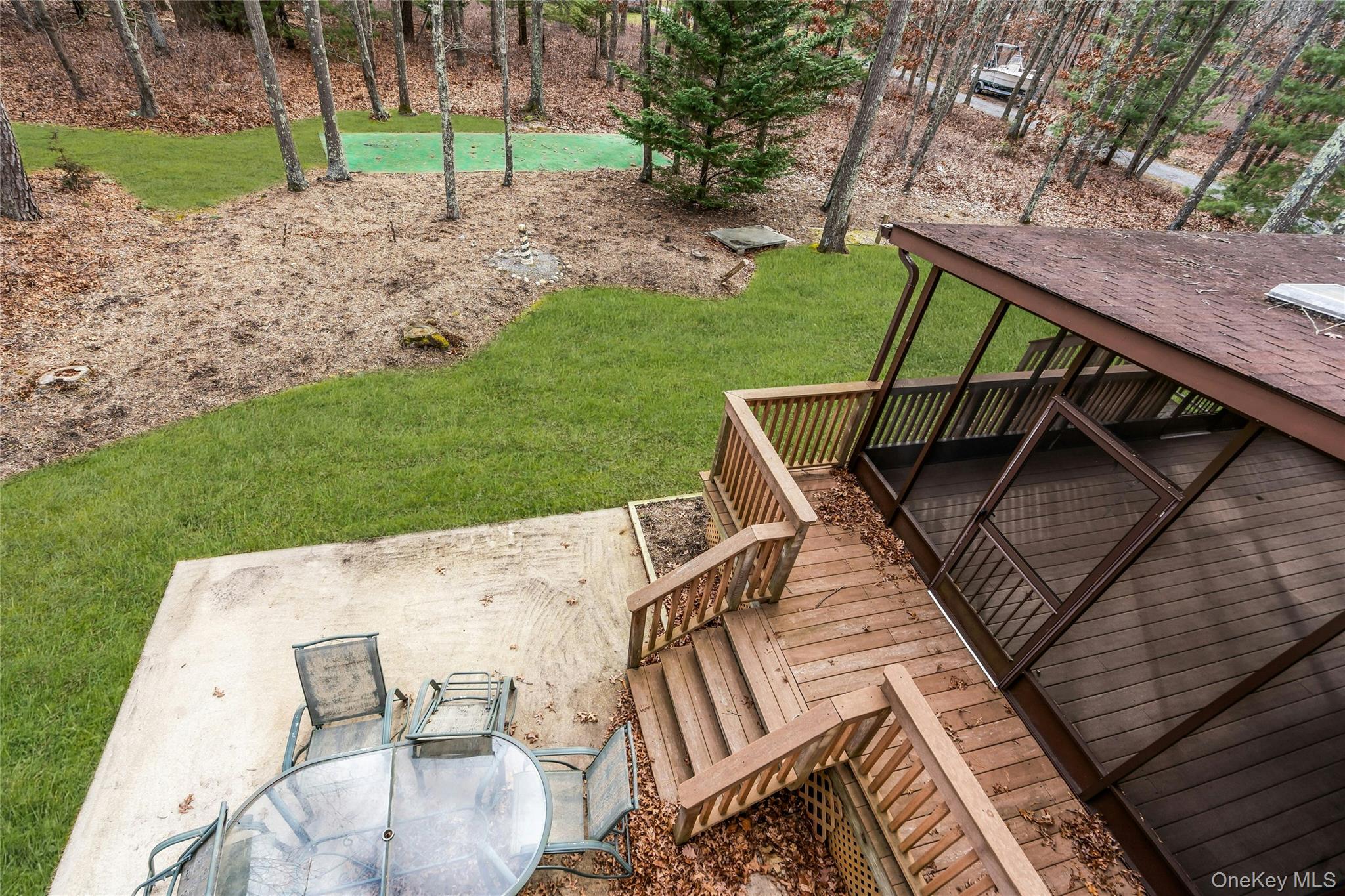23 Bellows Terrace Hampton Bays, NY 11946 - Photo 23 of 31 a view of outdoor space yard and patio