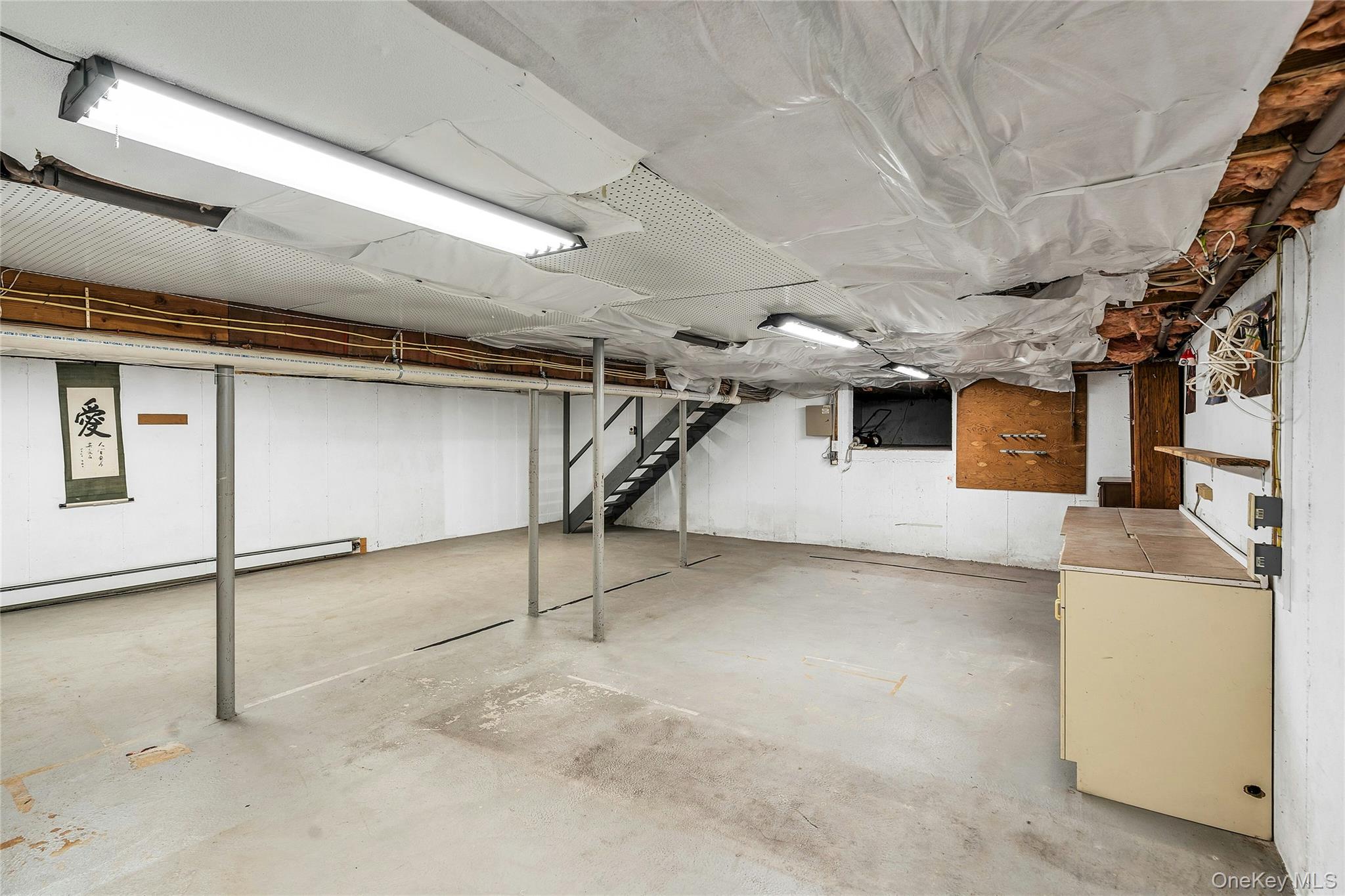 23 Bellows Terrace Hampton Bays, NY 11946 - Photo 25 of 31 a view of a garage