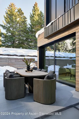 a bedroom with a bed and a tv