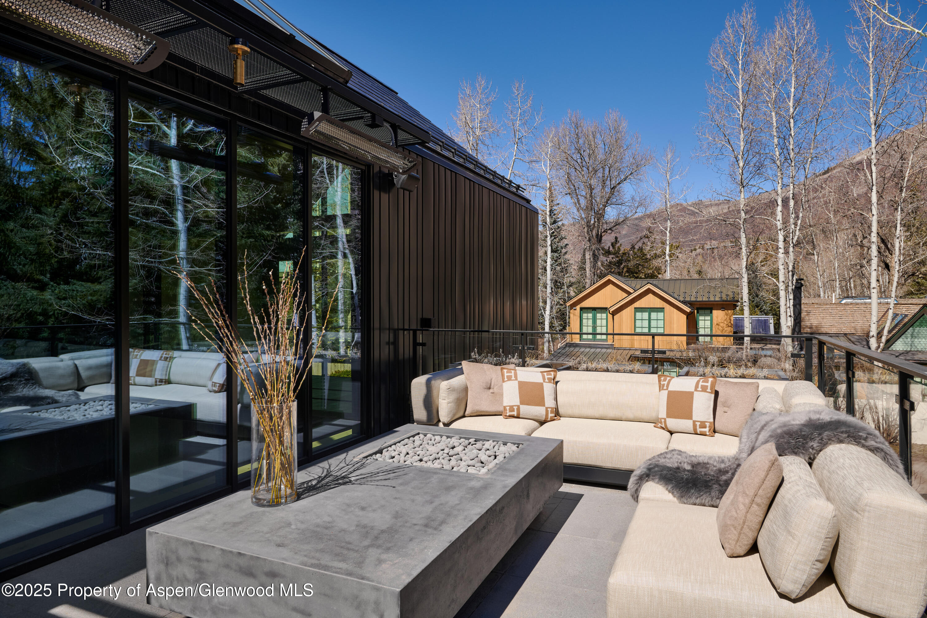 411 Pearl Court Aspen, CO 81611 - Photo 27 of 45 a view of a house with backyard and porch