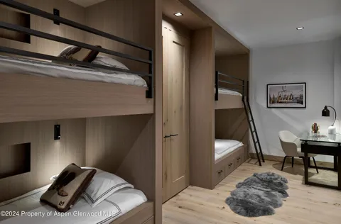 a view of a wooden house with a large windows