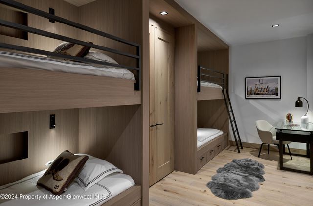 a view of a wooden house with a large windows