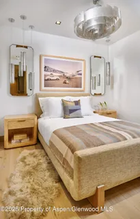 a house that has a tree in front of it