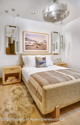 a house that has a tree in front of it