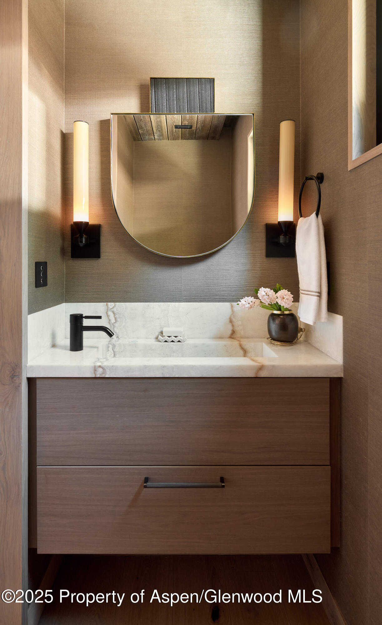 411 Pearl Court Aspen, CO 81611 - Photo 39 of 45 a bathroom with a sink and a mirror