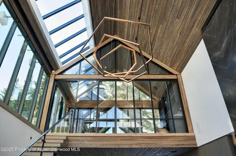 a kitchen with a sink cabinets and window