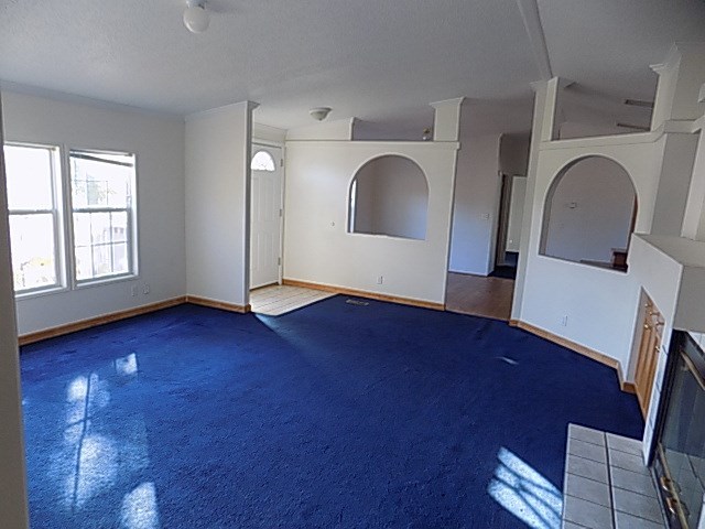 304 Tucker Road Lizella, GA 31052 - Photo 13 of 18 an empty room with wooden floor and windows