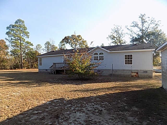 304 Tucker Road Lizella, GA 31052 - Photo 16 of 18 a view of a house with a yard