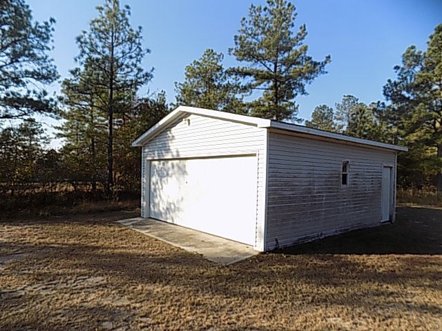 304 Tucker Road Lizella, GA 31052 - Photo 17 of 18 a view of a house with a yard
