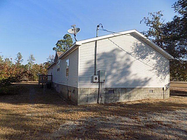 304 Tucker Road Lizella, GA 31052 - Photo 18 of 18 a view of a house with a yard
