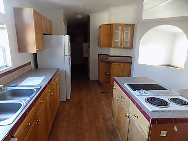 304 Tucker Road Lizella, GA 31052 - Photo 5 of 18 a kitchen with a refrigerator sink and stove