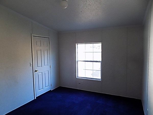 304 Tucker Road Lizella, GA 31052 - Photo 10 of 18 an empty room with windows