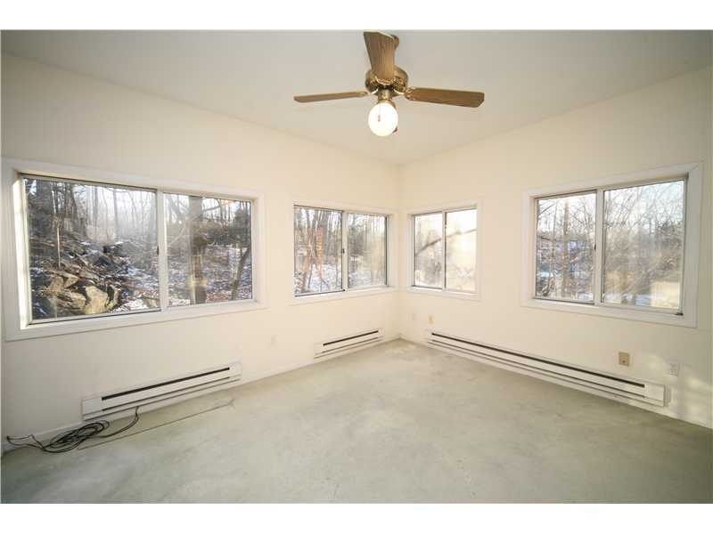 4 Locust Hill Road Darien, CT 06820 - Photo 12 of 25 a view of an empty room with a window