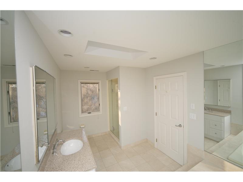 4 Locust Hill Road Darien, CT 06820 - Photo 16 of 25 a bathroom with a toilet