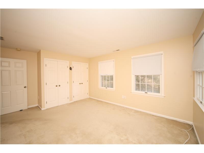 4 Locust Hill Road Darien, CT 06820 - Photo 18 of 25 a view of an empty room with a window