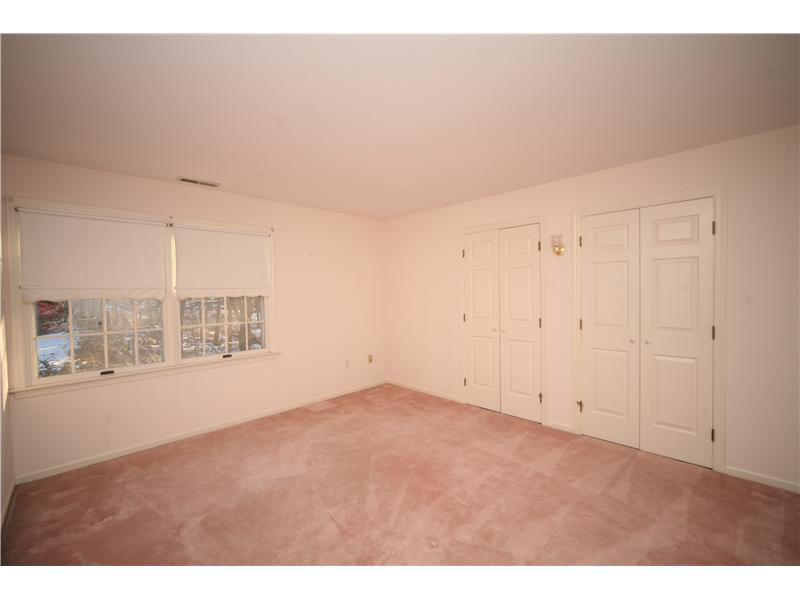 4 Locust Hill Road Darien, CT 06820 - Photo 19 of 25 a view of an empty room with a window