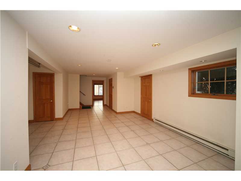 4 Locust Hill Road Darien, CT 06820 - Photo 23 of 25 a view of an empty room and window