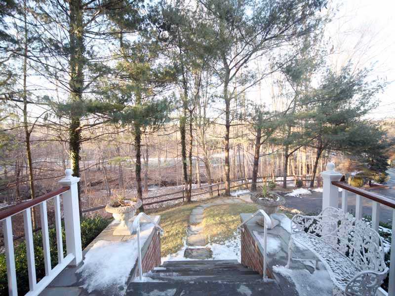 4 Locust Hill Road Darien, CT 06820 - Photo 24 of 25 a view of a yard with swimming pool