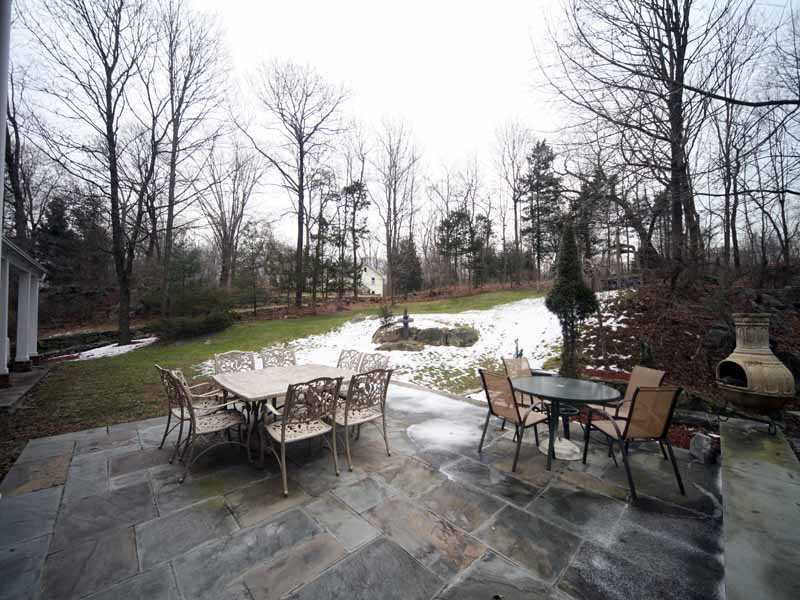 4 Locust Hill Road Darien, CT 06820 - Photo 25 of 25 a view of a patio with a yard