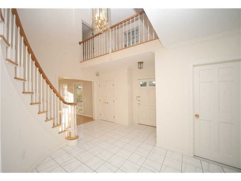 4 Locust Hill Road Darien, CT 06820 - Photo 3 of 25 a view of entryway with stairs