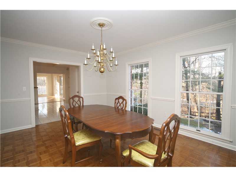 4 Locust Hill Road Darien, CT 06820 - Photo 6 of 25 a view of a dining room with furniture and window