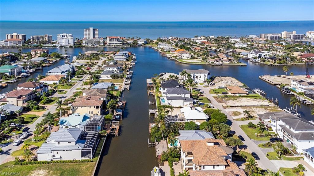 452 Willet Avenue Naples, FL 34108 - Photo 26 of 28 a view of a city with ocean view