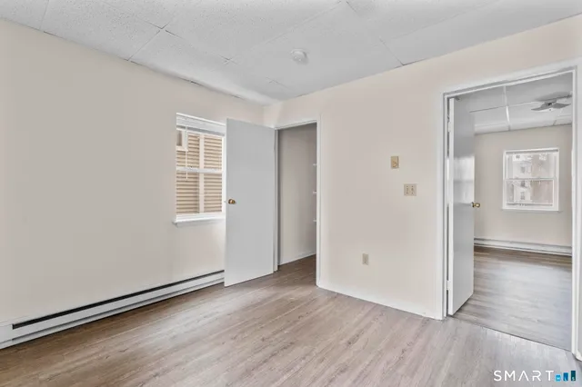 a kitchen with stainless steel appliances a refrigerator stove and microwave