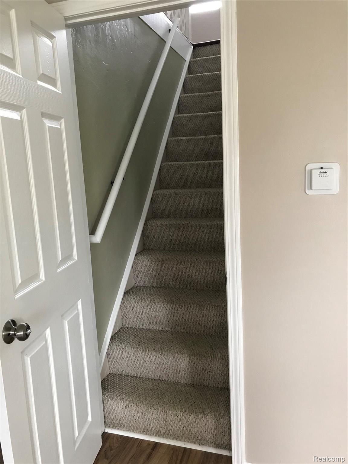 2173 South Dye Road Flint, MI 48532 - Photo 18 of 26 Stairway to Upper Bedroom