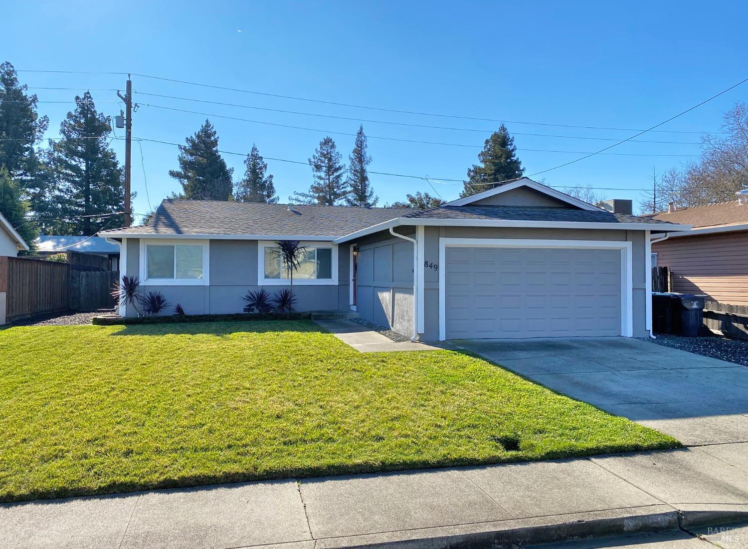 849 Finch Way Fairfield, CA 94533 - Photo 2 of 26 a front view of a house with a yard