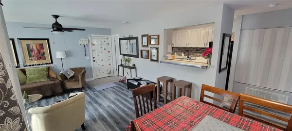 a view of bathroom with a washer and dryer