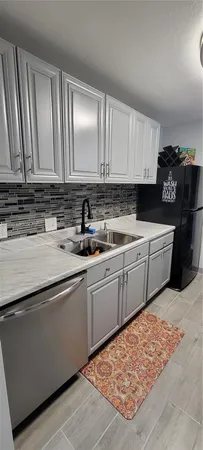a bathroom with a toilet and a sink