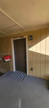 a view of wooden floor in an empty room