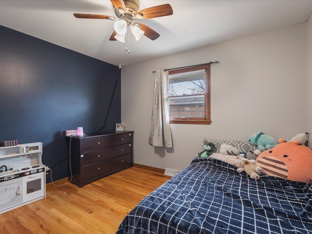 4821 Danforth Drive Rockford, IL 61114 - Photo 13 of 28 a bedroom with a bed and a window