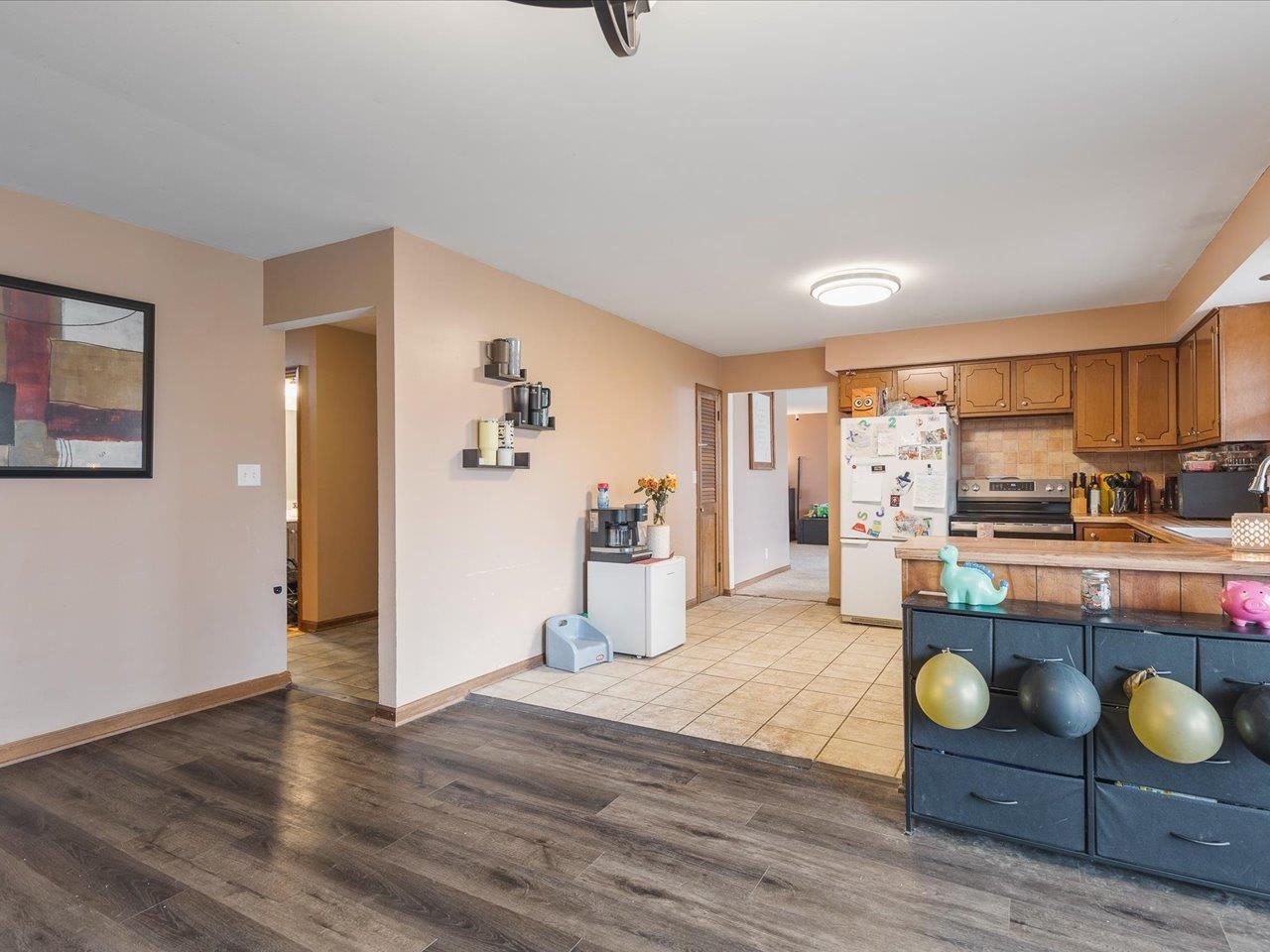 4821 Danforth Drive Rockford, IL 61114 - Photo 6 of 28 a living room with furniture and a flat screen tv