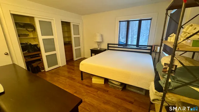 a bathroom with a sink toilet and mirror