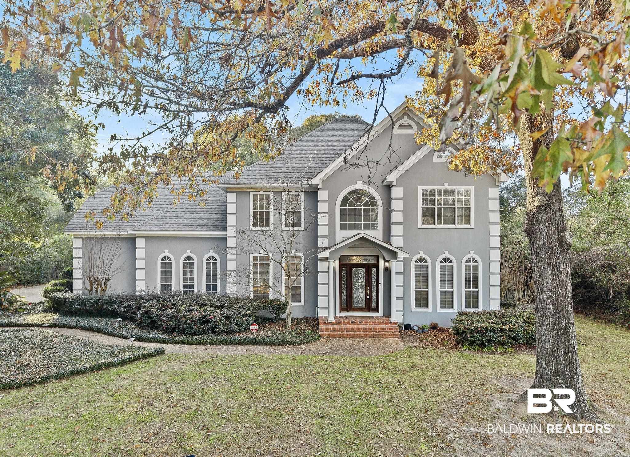 2100 Stonebrook Drive West Mobile, AL 36695 - Photo 1 of 60 View of front of property featuring a front lawn