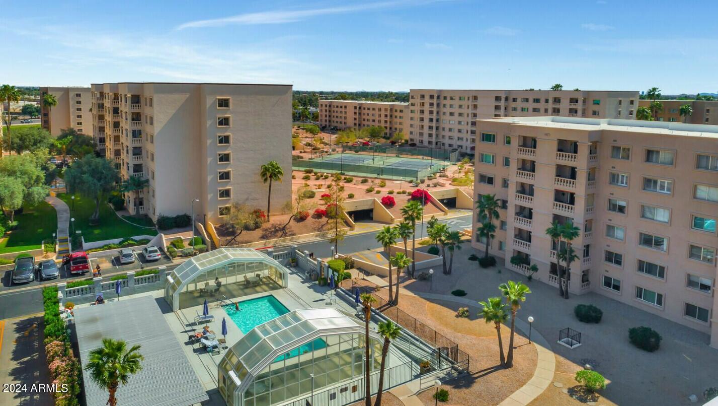 7950 East Camelback Road, Unit 111 Scottsdale, AZ 85251 - Photo 24 of 30 Ariel of Covered Pool + Courts