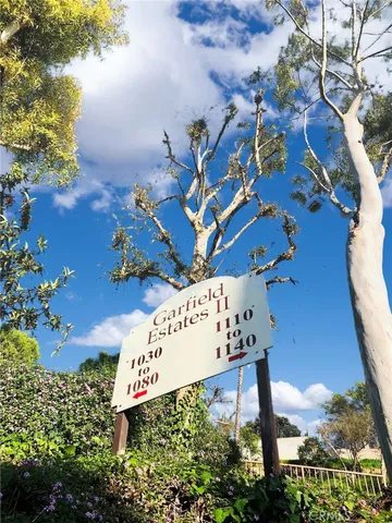 with sign on the side of the road