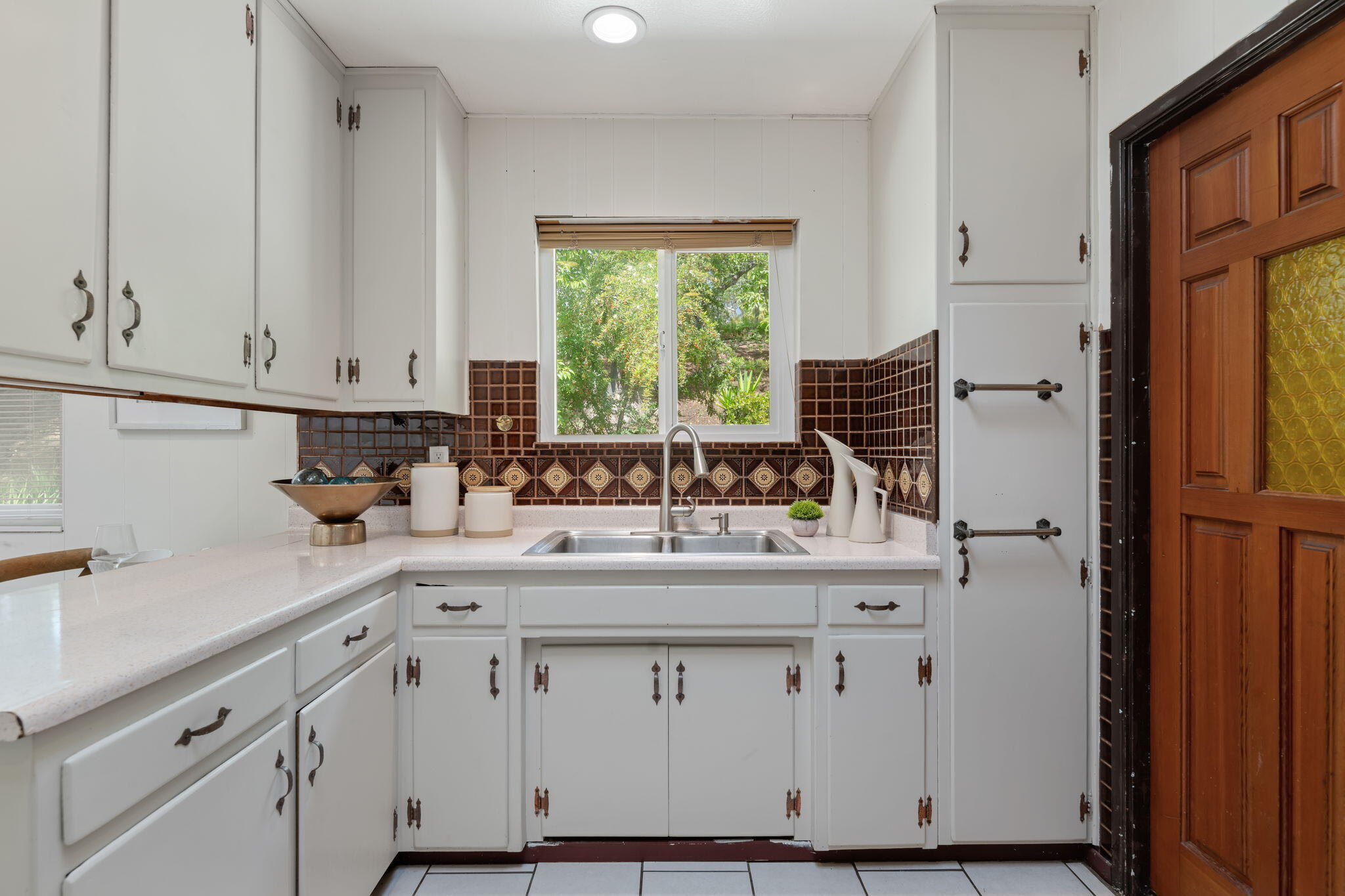 3855 Foothill Road Santa Barbara, CA 93110 - Photo 24 of 39 a kitchen with a sink cabinets and window