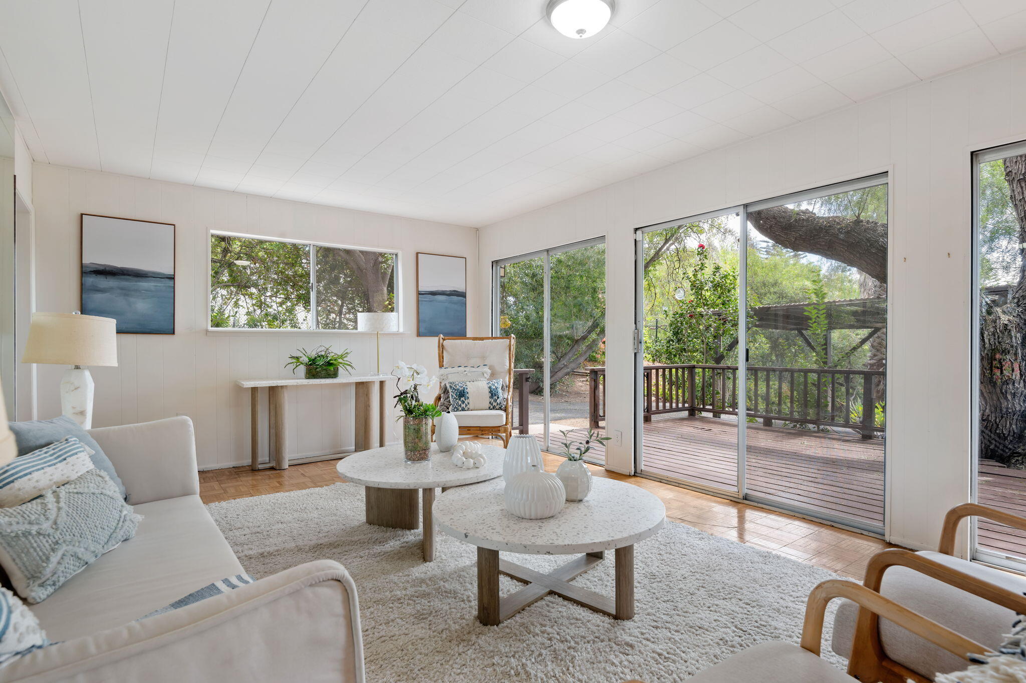 3855 Foothill Road Santa Barbara, CA 93110 - Photo 10 of 39 a living room with furniture and a floor to ceiling window