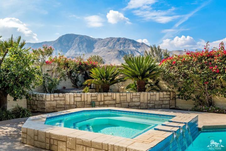 74 Mayfair Drive Rancho Mirage, CA 92270 - Photo 1 of 35 a view of outdoor space yard and swimming pool