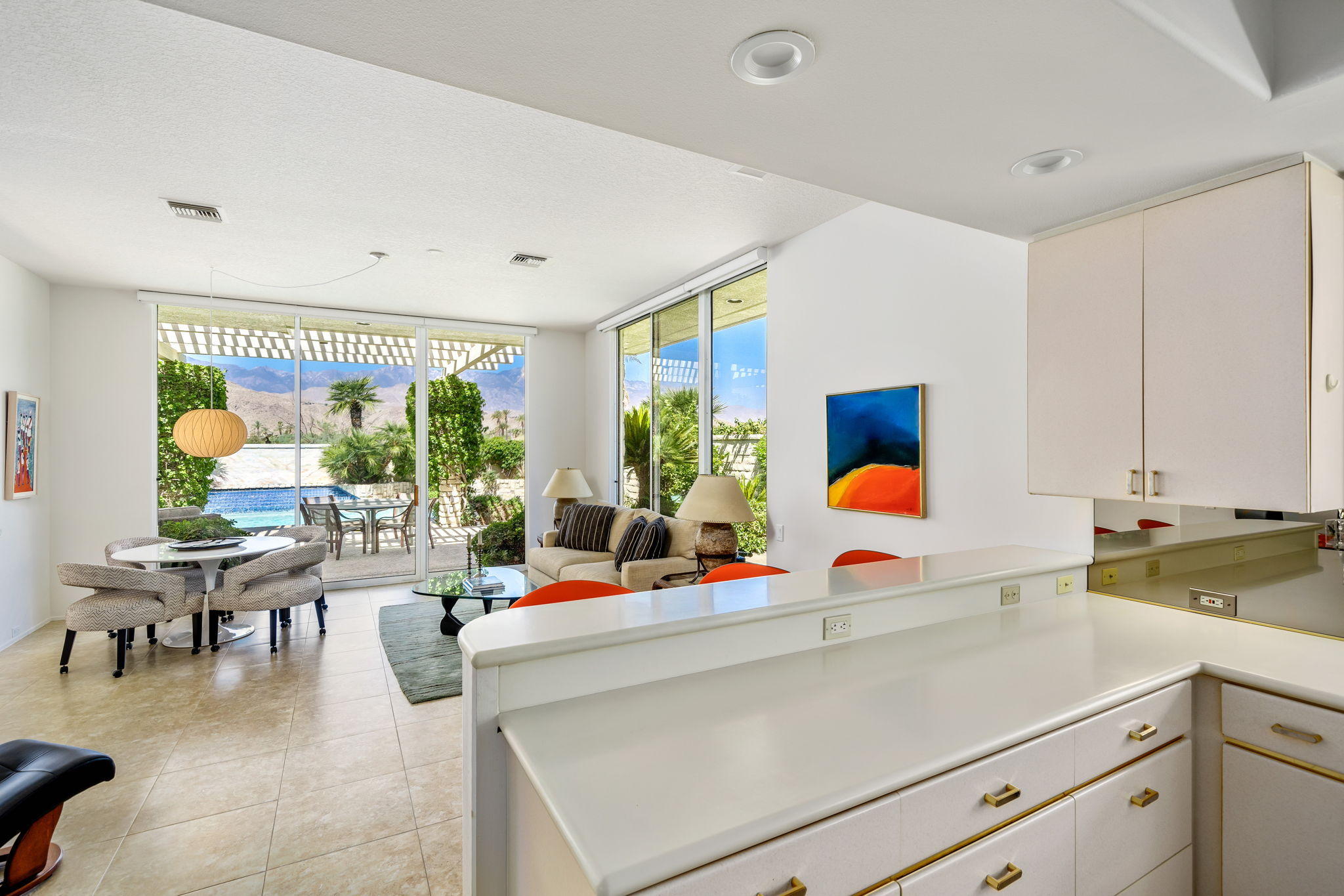 74 Mayfair Drive Rancho Mirage, CA 92270 - Photo 11 of 35 a living room with furniture and a large window